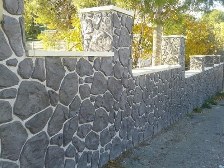 Cerramiento exterior terminado con acabado decorativo de piedra